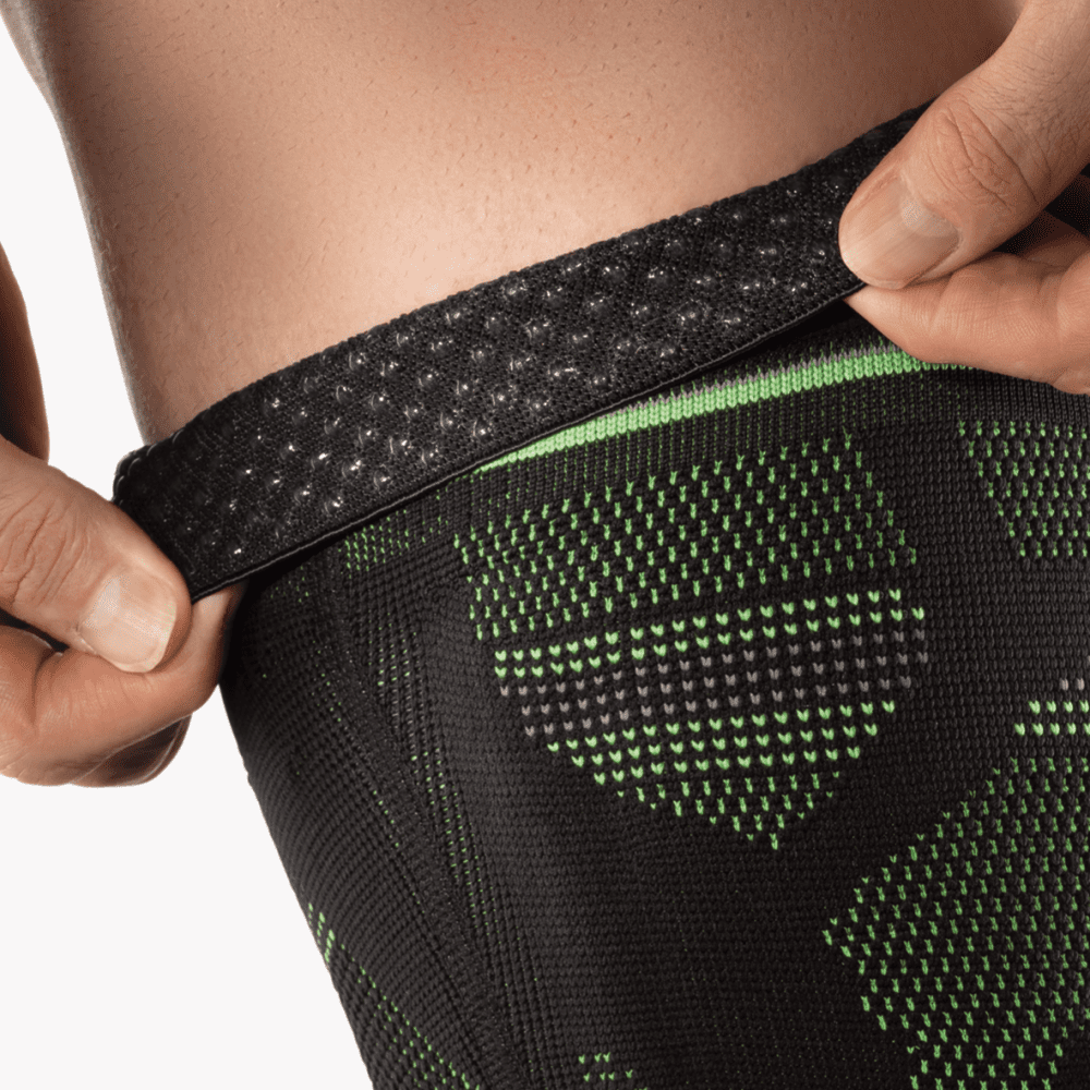 BORT StabiloGen Sport mit Haftband Kniebandage, schwarz/grün – Bild 3